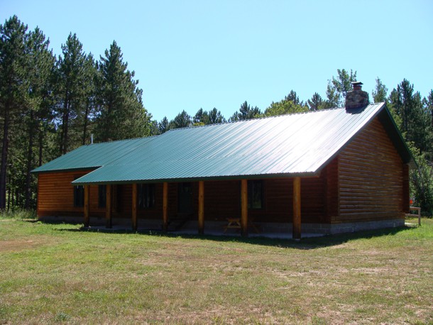 School forest log cabin